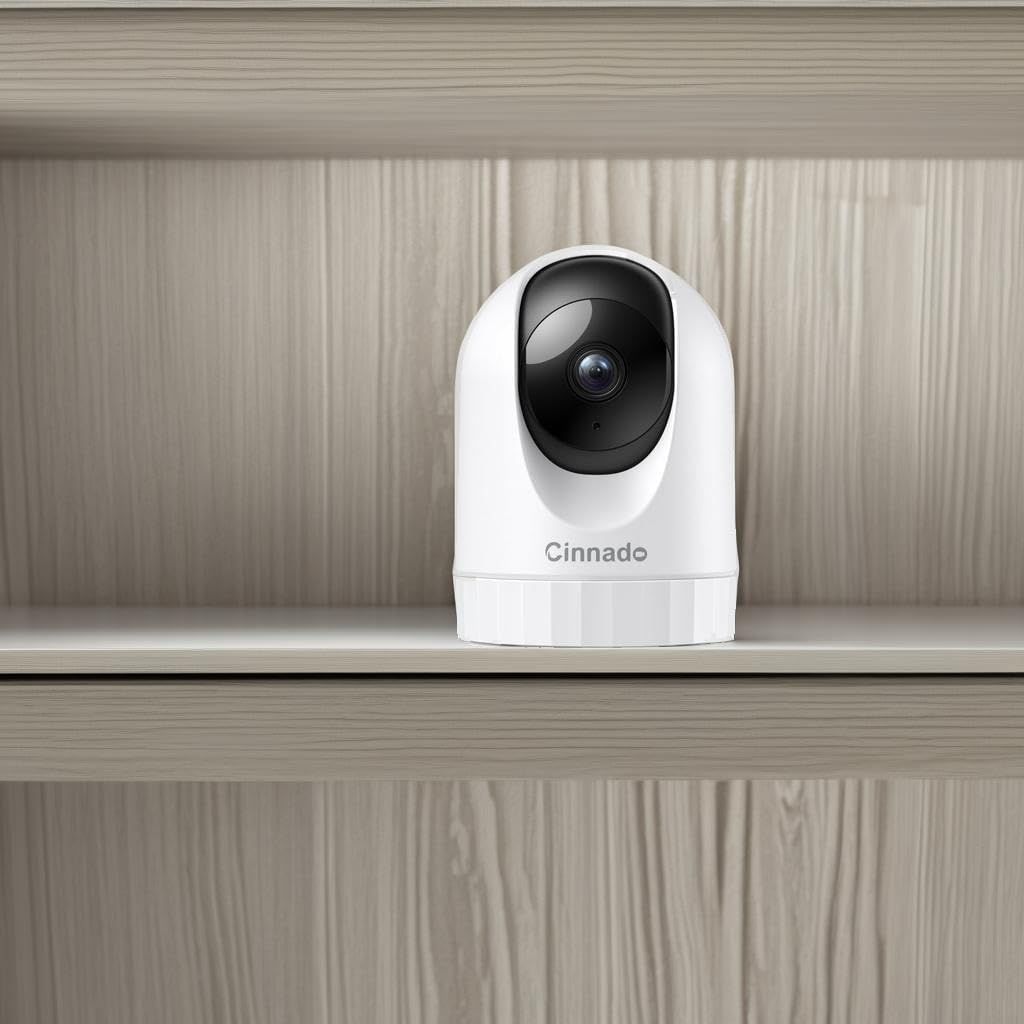 Demonstrates the product in a real-world home environment to help shoppers visualize how the security camera would look on a shelf in their own space.