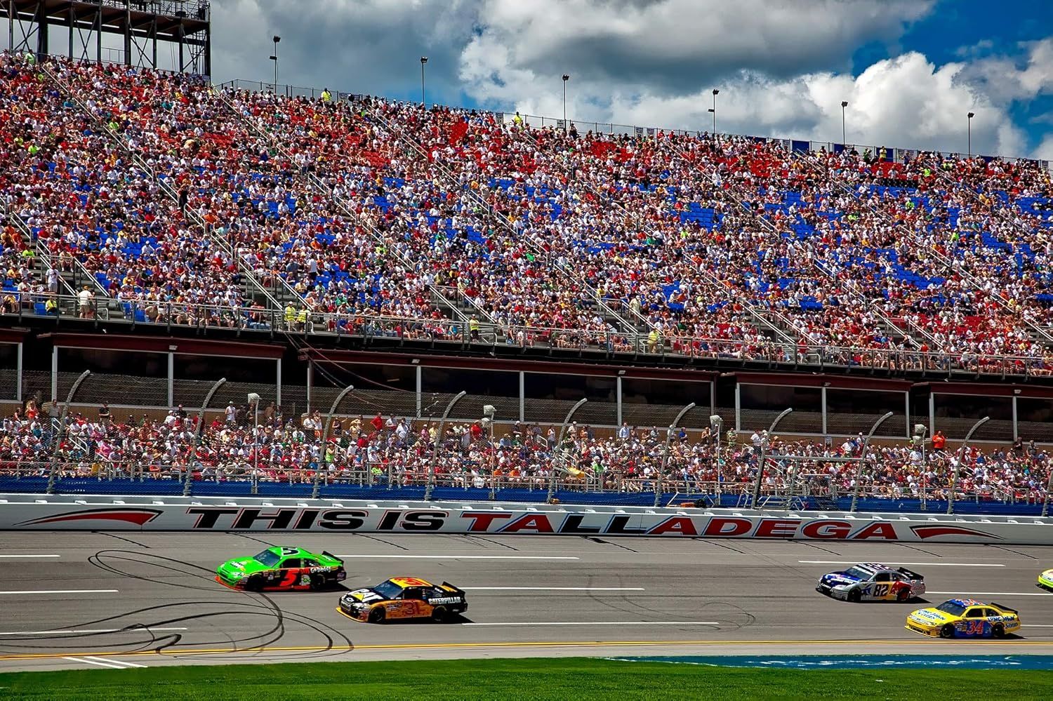 Demonstrates the product in a real-world racing environment at Talladega Superspeedway, showing the product's application in professional motorsports to build excitement and authenticity.
