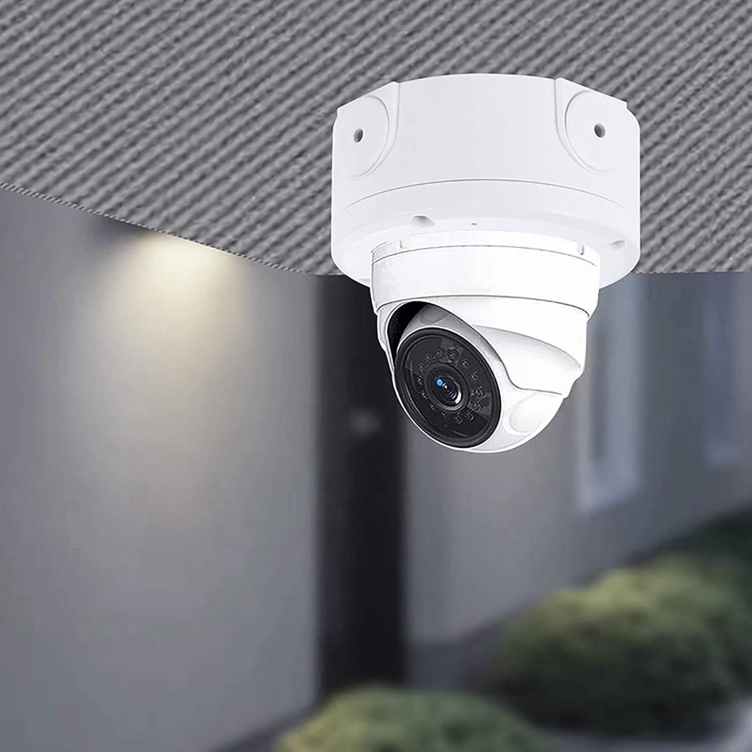 Shows the security camera installed in a real-world setting to help shoppers visualize how the product looks when mounted and in use.