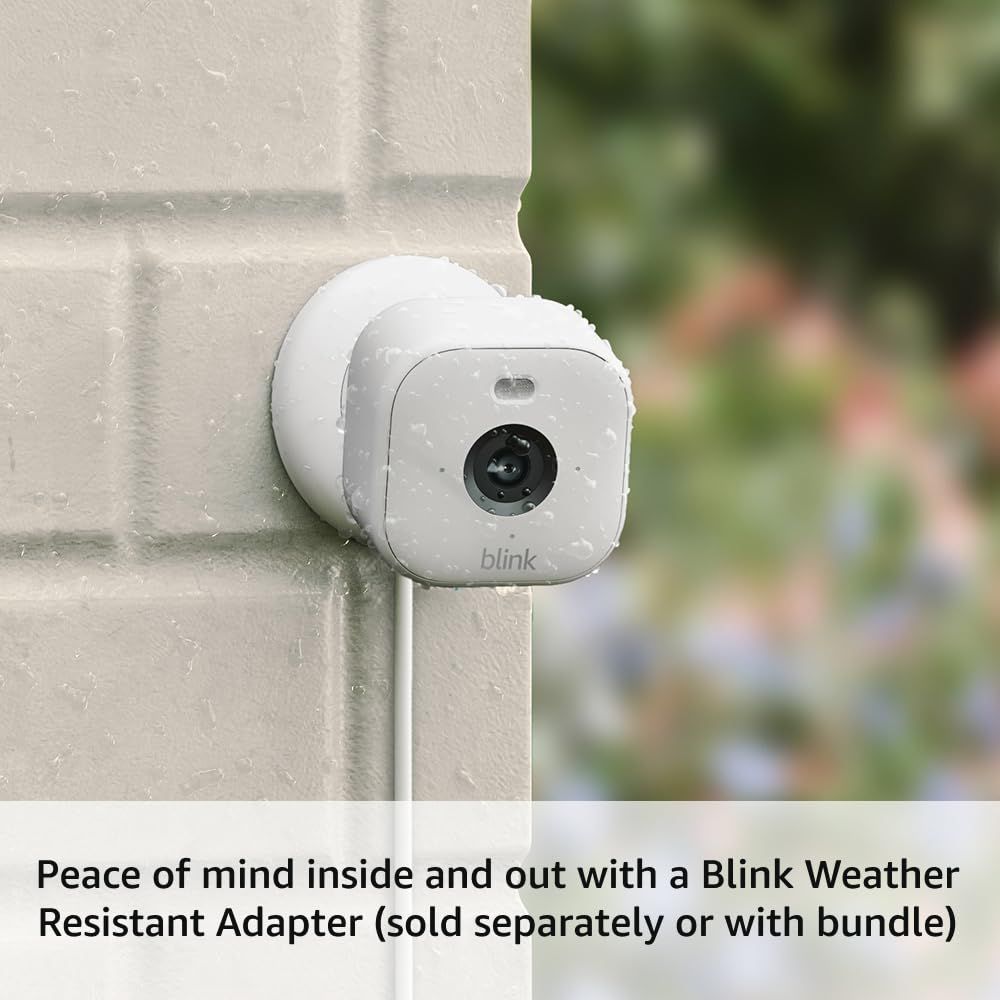 Demonstrates the product's weather-resistant capability by showing the Blink camera mounted outdoors in wet conditions, reassuring shoppers it can withstand rain and outdoor elements.