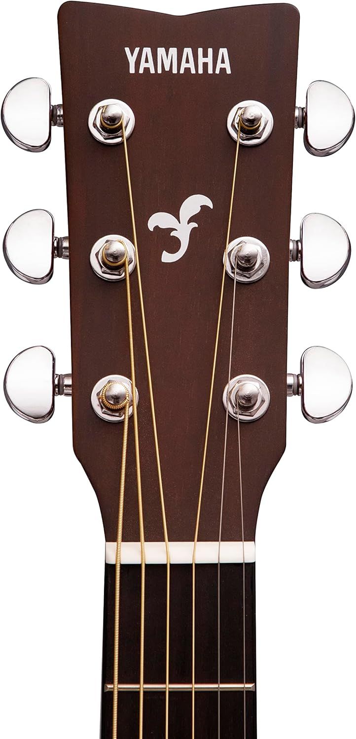 Displays the product on a clean white background to show the Yamaha guitar headstock, tuning pegs, and brand logo clearly for catalog purposes.