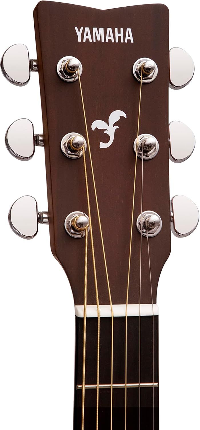 Provides a clean, catalog-style view of the guitar headstock showing the Yamaha branding, tuning pegs, and decorative inlay to help shoppers see product details and craftsmanship.