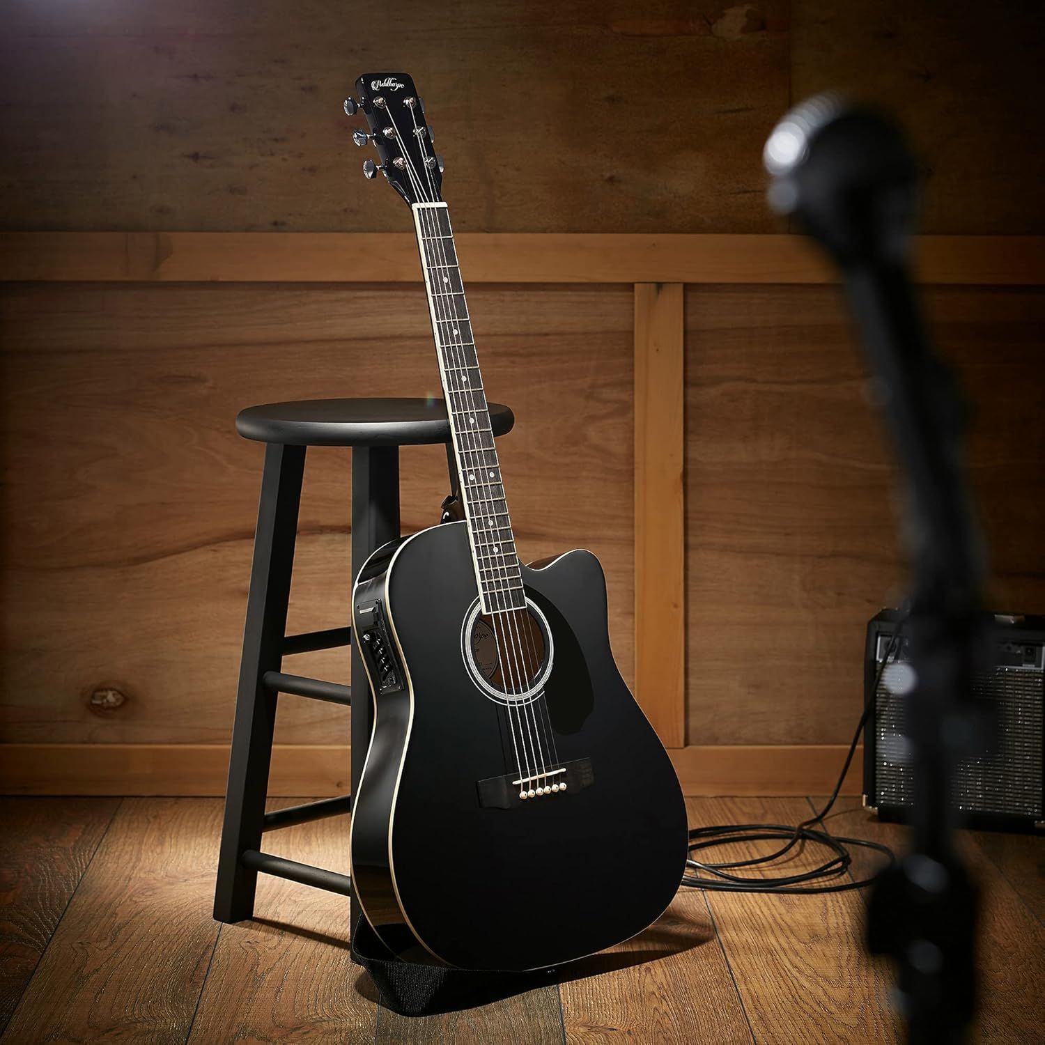 Showcases the guitar in an authentic, aspirational lifestyle setting to help shoppers visualize the product in their own space and connect emotionally with the product.
