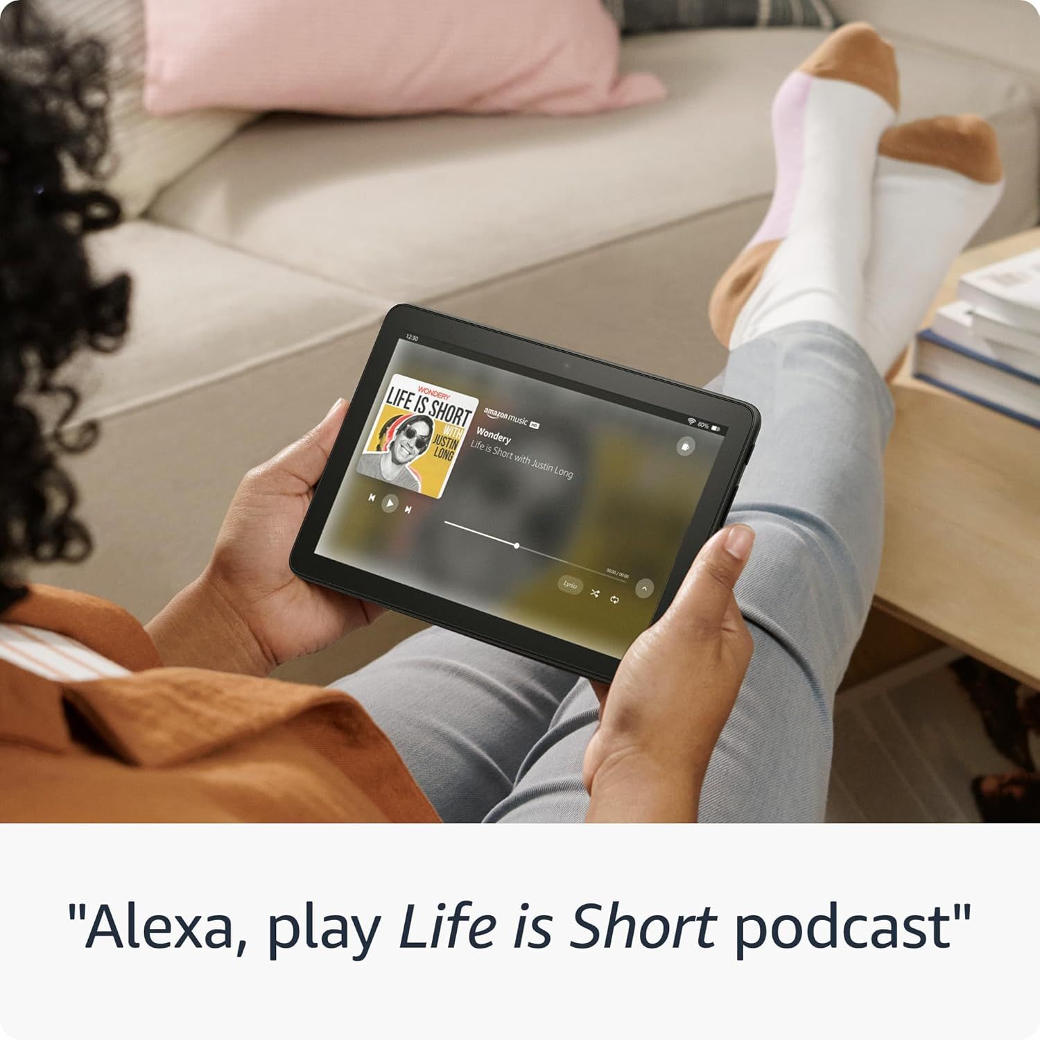 Demonstrates how to use voice commands with Alexa to play podcasts on the device, showing the ease of hands-free control and smart home integration. Highlights the convenience of voice-activated…