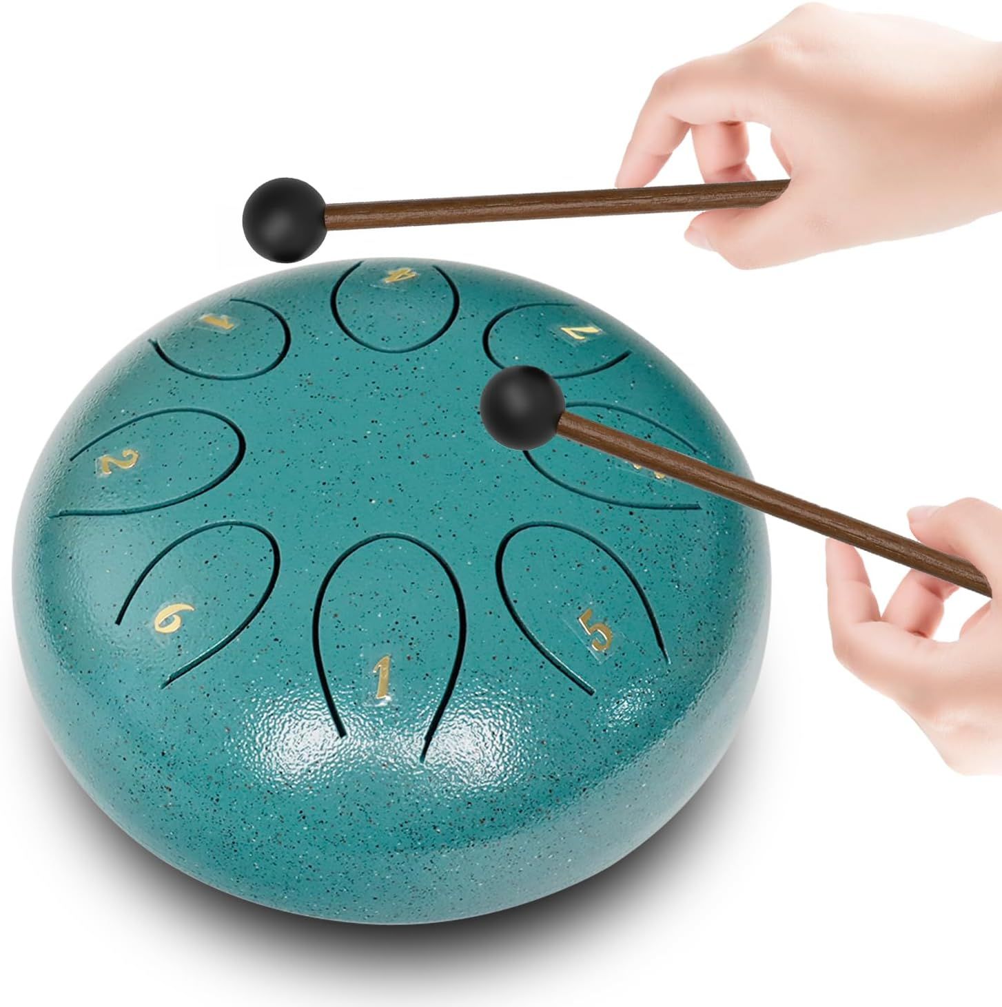 Shows the product being played in a real-world context to help shoppers visualize how the steel tongue drum is used with the included mallets.