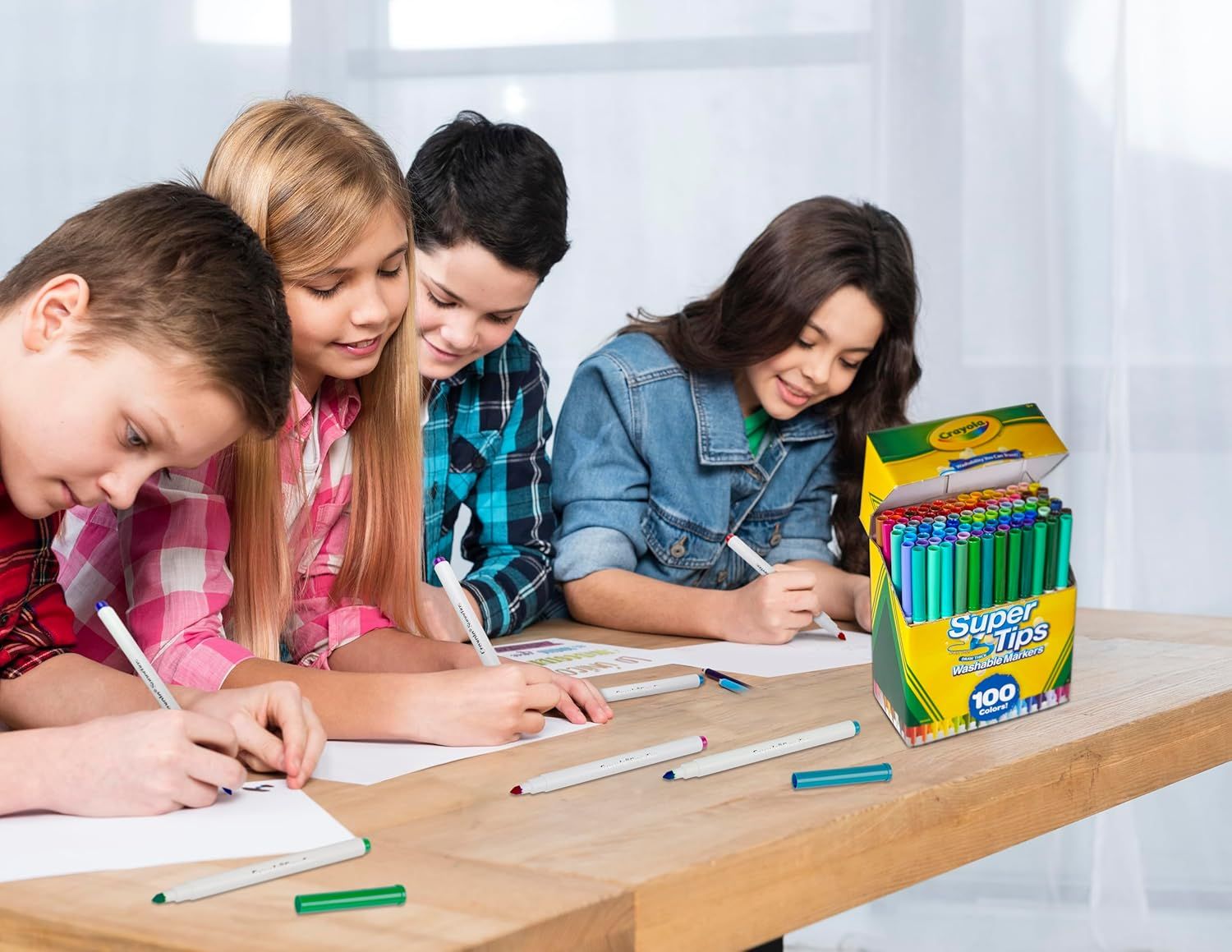Demonstrates the product being used by children in a real-world classroom or homework scenario to help shoppers visualize the product in everyday use.