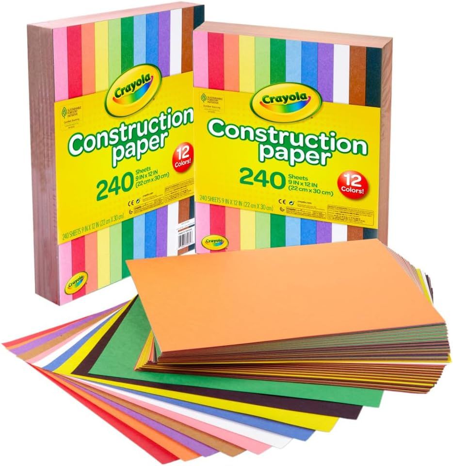 Shows the customer everything included in the purchase: two boxes of construction paper and the full stack of 240 colorful sheets, helping shoppers understand the quantity and variety they receive.