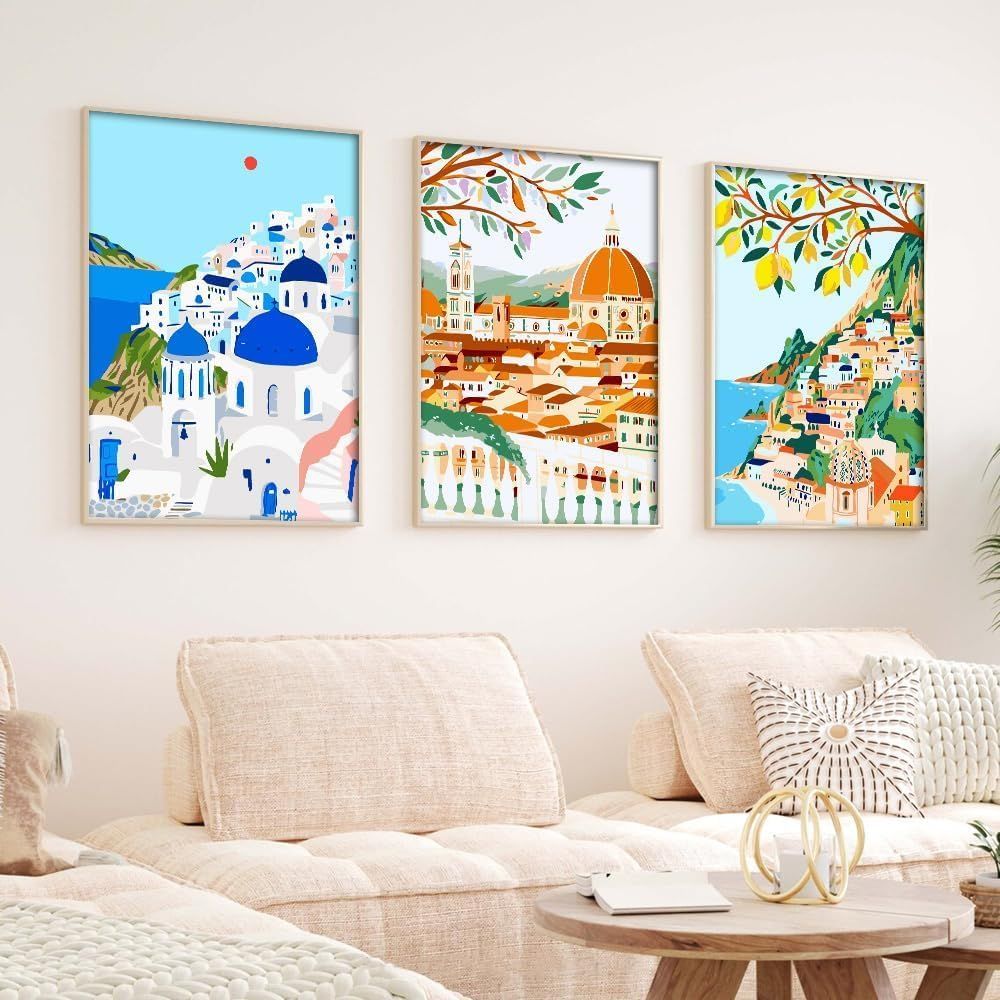 Demonstrates how the product (framed art prints) looks when displayed in a real home setting, helping shoppers visualize the product in their own living space.