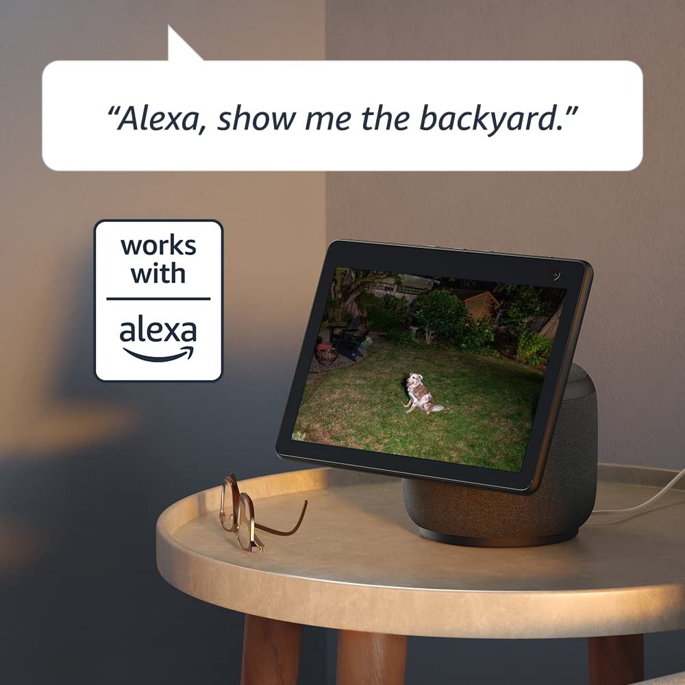 Demonstrates the product's voice-activated capability with Alexa to view camera feeds, reassuring shoppers of seamless smart home integration and hands-free convenience.