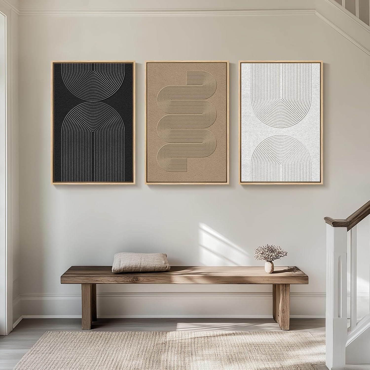 Demonstrates how the product (wall art set) looks when displayed in a real home environment, helping shoppers visualize the aesthetic and scale in their own space.