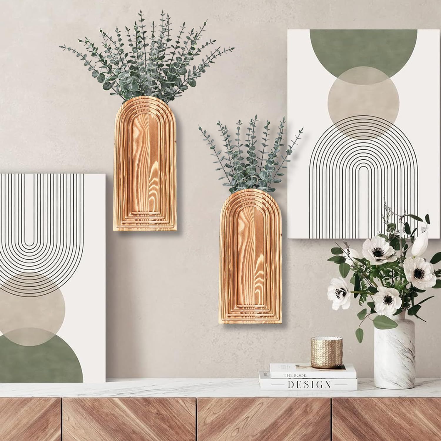 Showcases the product as decorative wall-mounted vases in a styled home environment to help shoppers visualize how the product looks in a real-world setting.