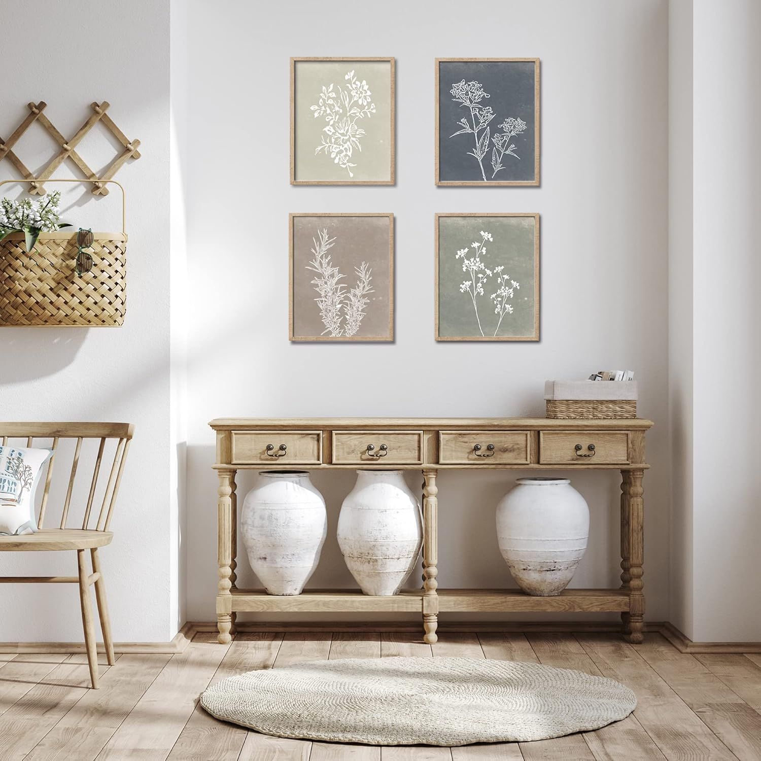 Demonstrates how the framed botanical prints look when styled in a real home environment, helping shoppers visualize the product in their own space.
