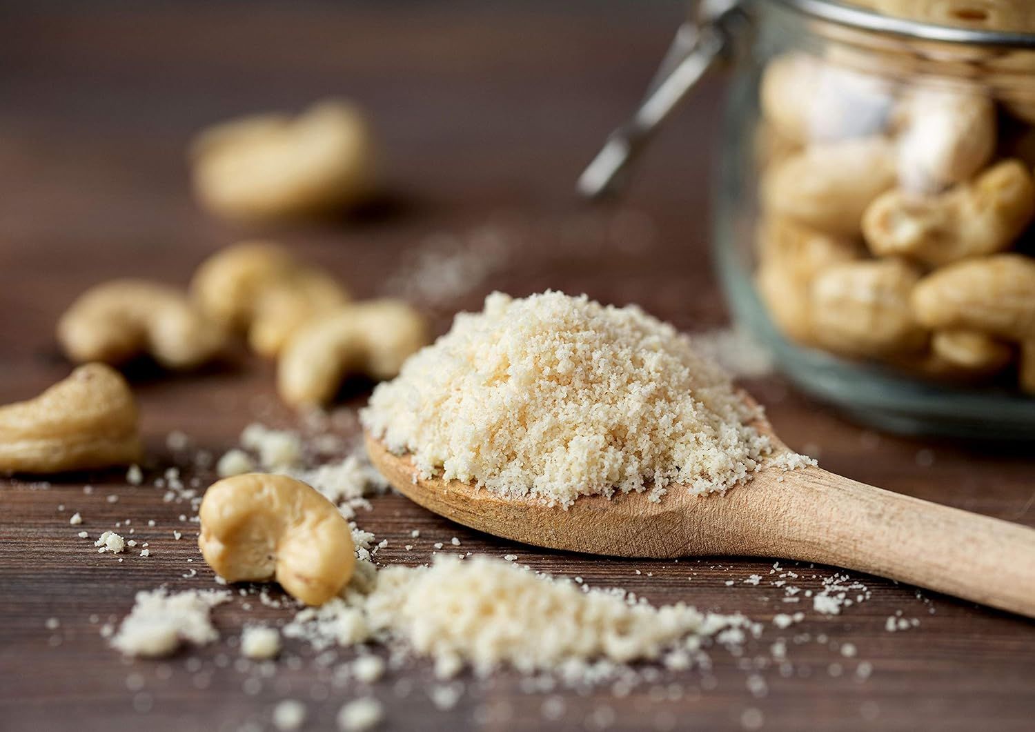 Showcases the product (cashew flour or ground cashews) in an authentic, natural setting to communicate freshness, quality, and the wholesome nature of the ingredient.