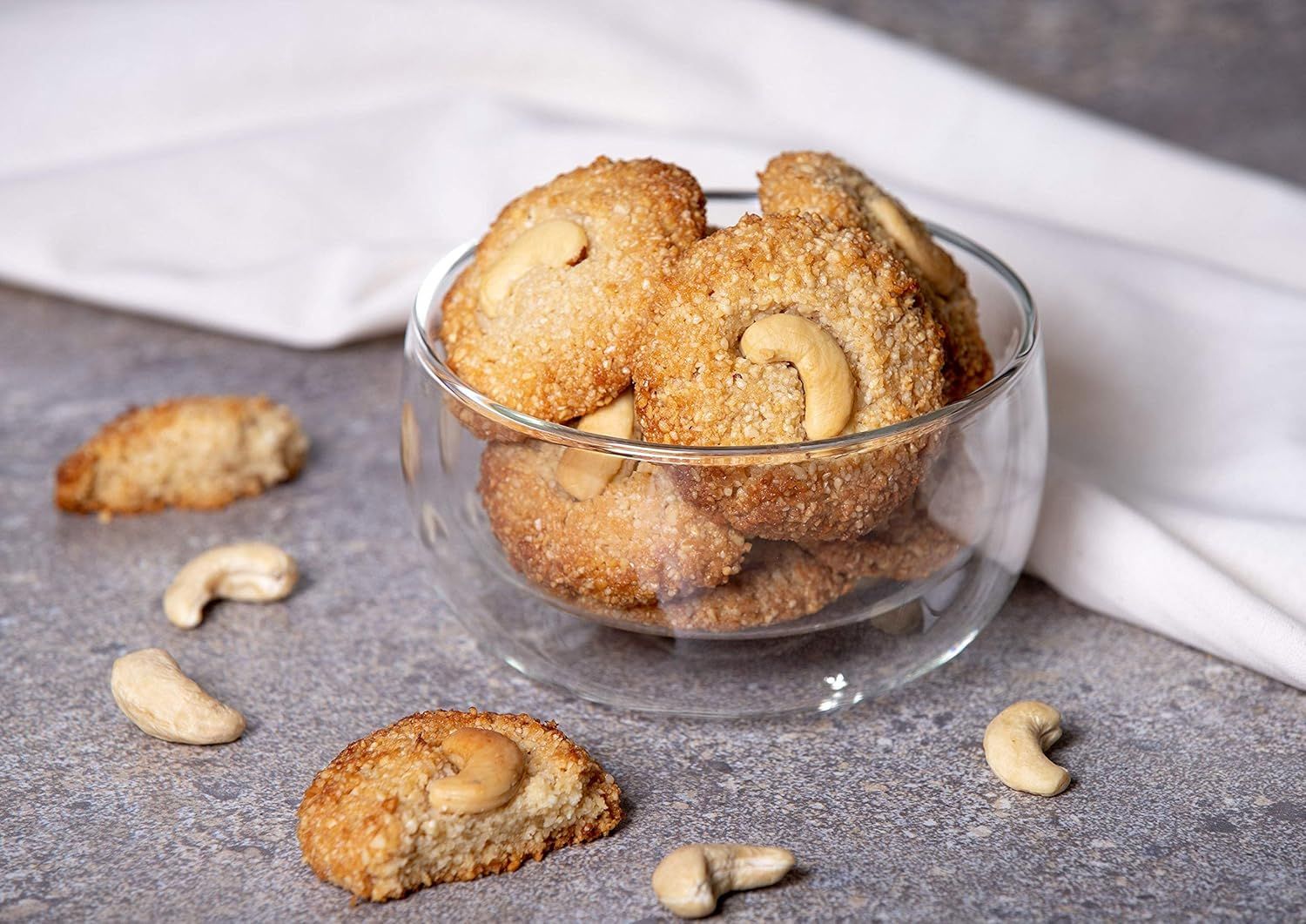 Showcases the product in an appealing, real-world kitchen setting to help shoppers visualize the product in their own lives and create an emotional connection.