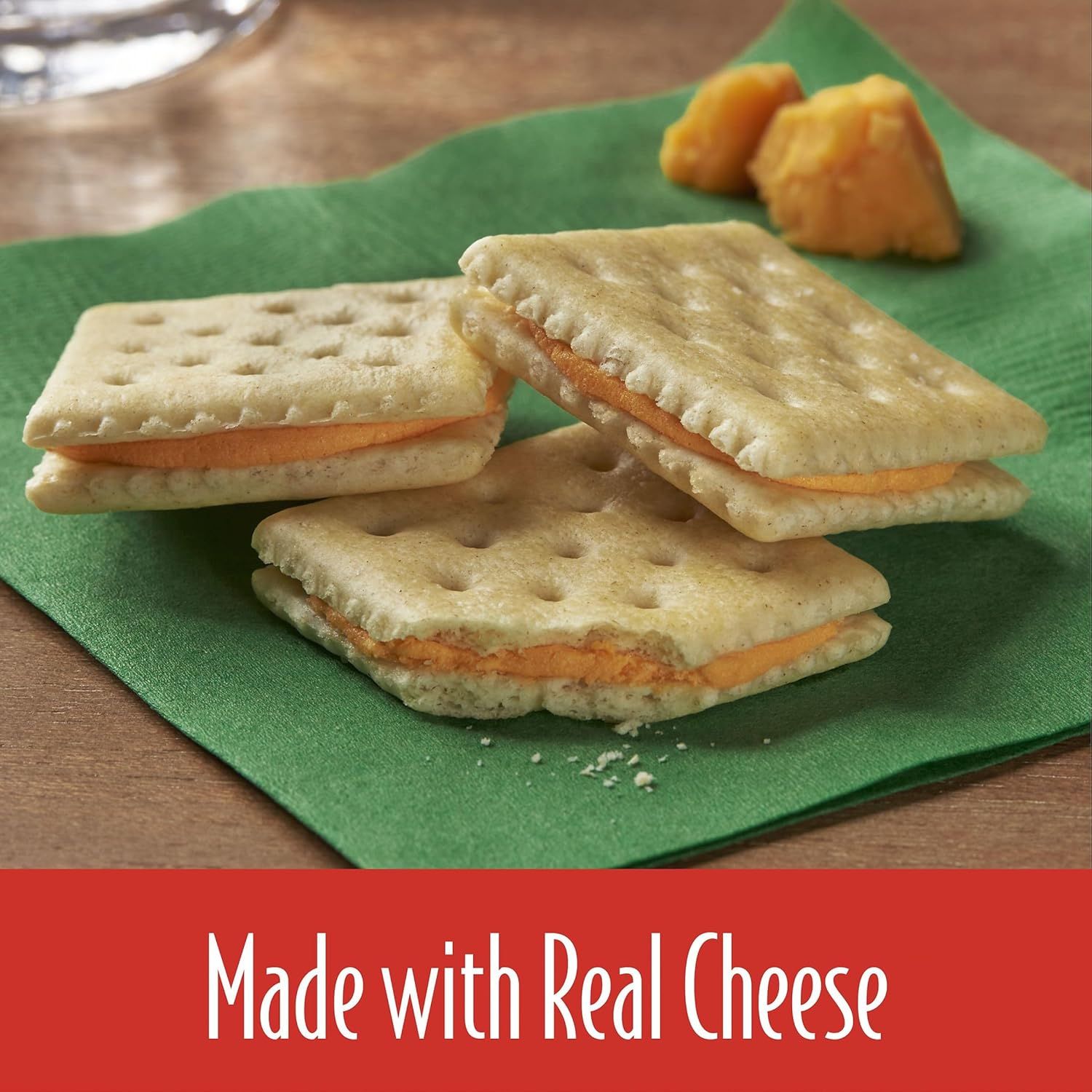 Communicates that the product is made with real cheese as a key ingredient, reassuring shoppers about quality and authentic flavor.