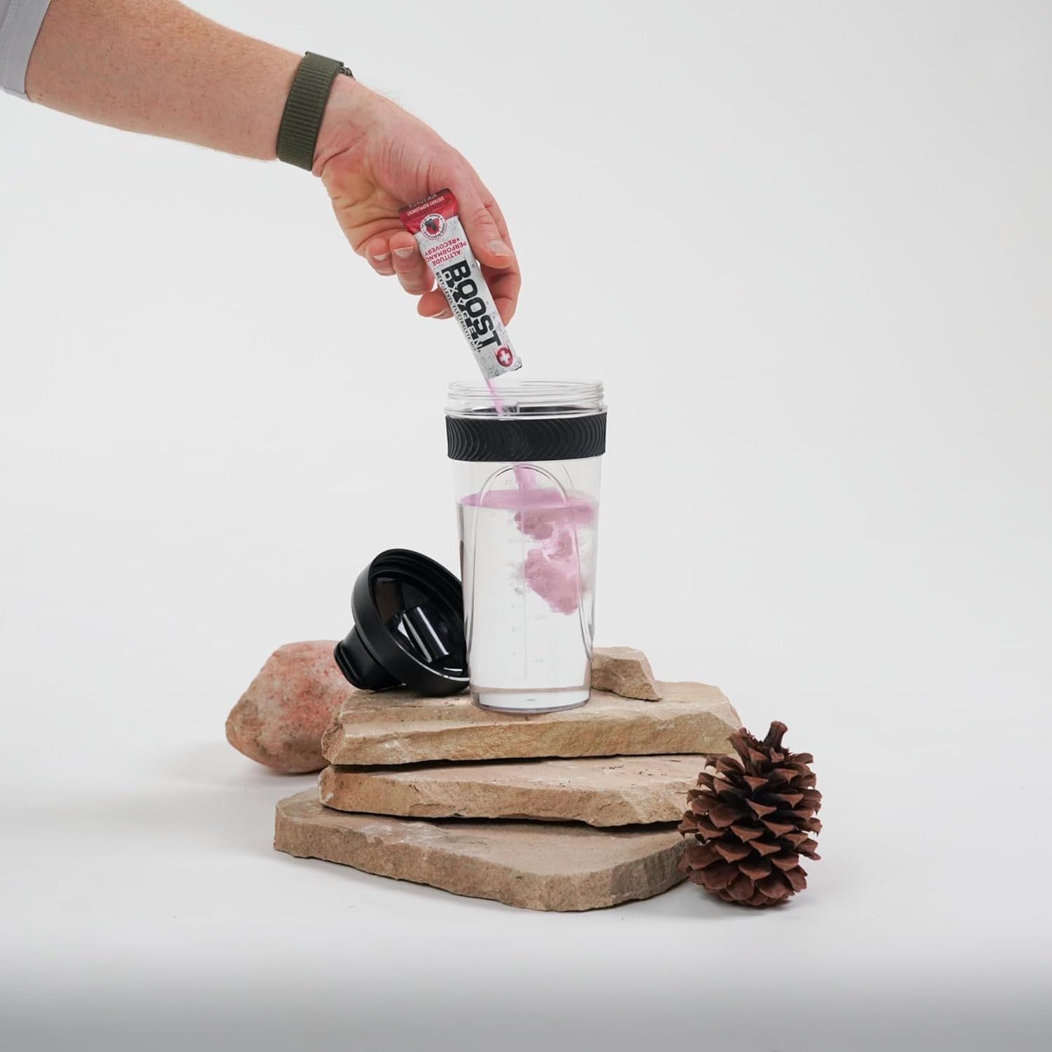 Demonstrates how to use the product by showing the simple process of adding the powder packet to water in the shaker bottle, reassuring shoppers that preparation is quick and effortless. Highlights…