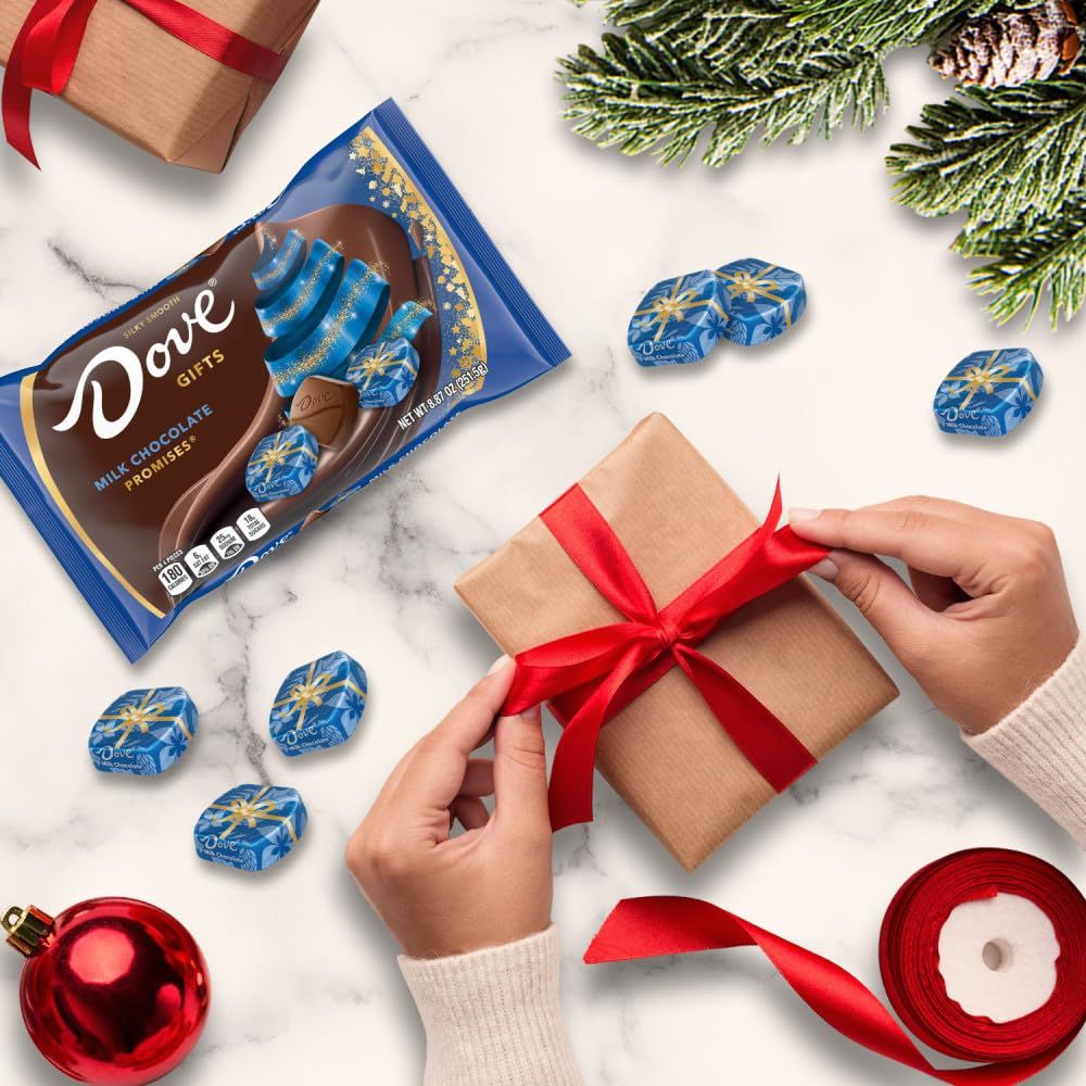 Positions the product as a perfect gift for the holiday season, using festive visual cues like wrapped gifts, red ribbons, evergreen branches, and ornaments to create a seasonal gifting appeal.