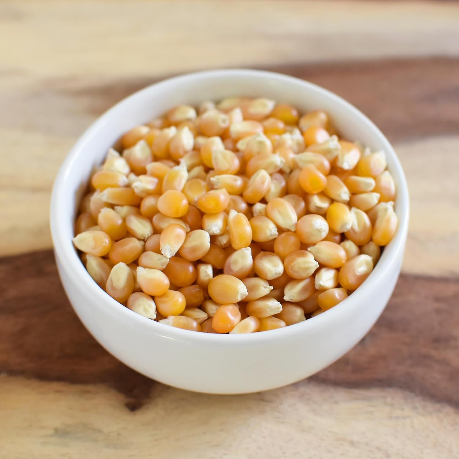 Displays the raw popcorn kernels in a clean, catalog-style presentation to show the product clearly without distractions.