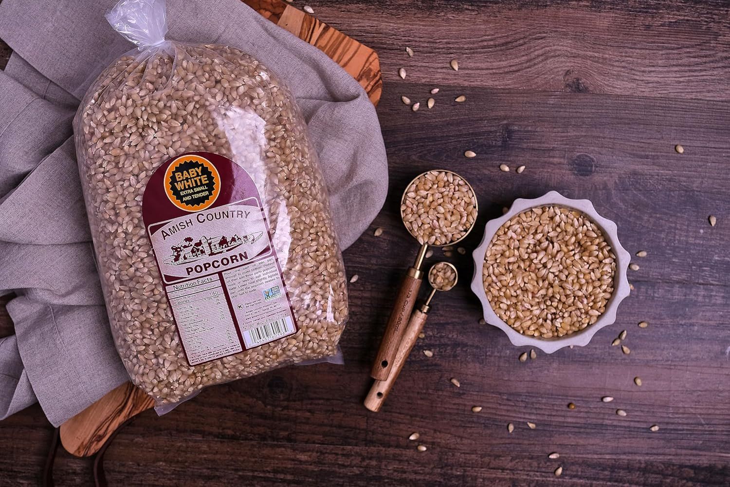 Showcases the product in an authentic, rustic lifestyle context to evoke a wholesome, artisanal feel and help shoppers visualize the product in their own kitchen or home setting.