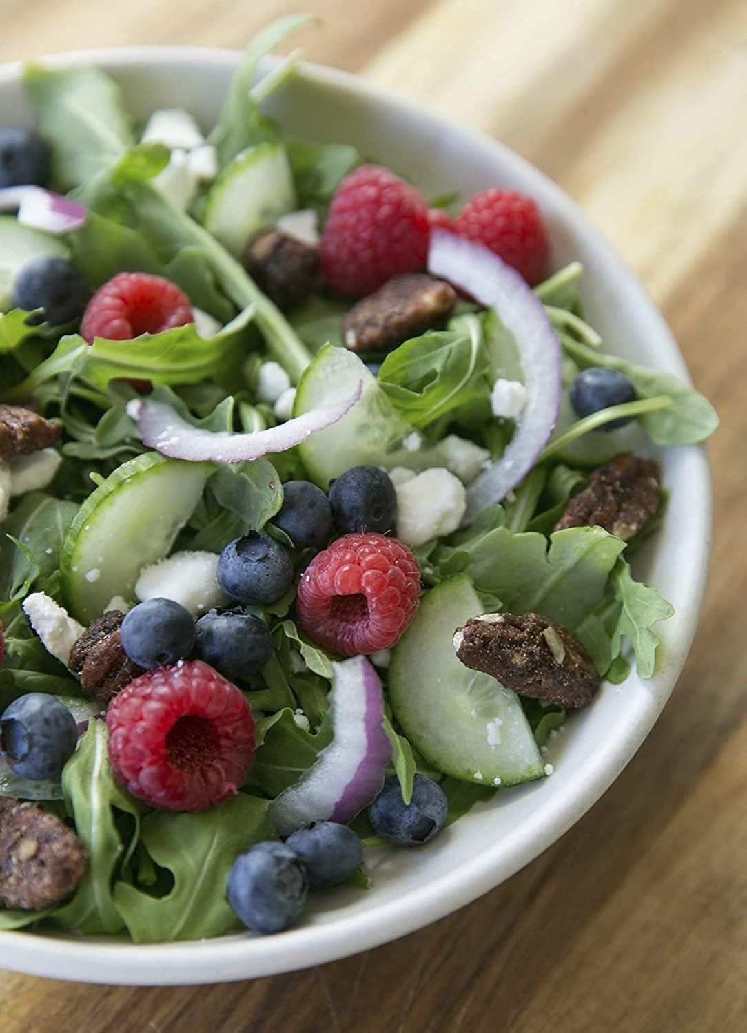 Showcases the product in a real-world dining context to help shoppers visualize the product as part of a healthy, appealing meal.