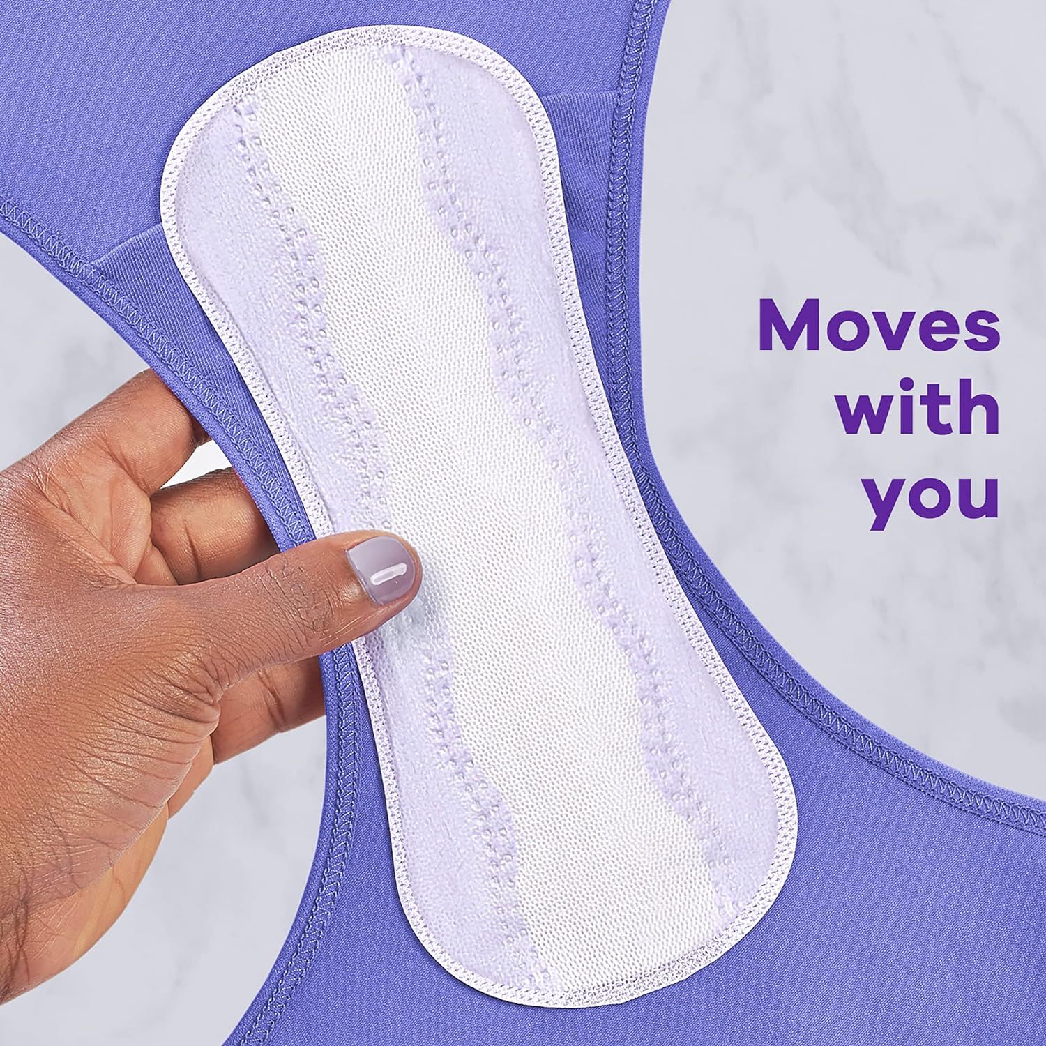 Demonstrates that the pad moves with the body and stays securely in place during activity, providing comfort and confidence.