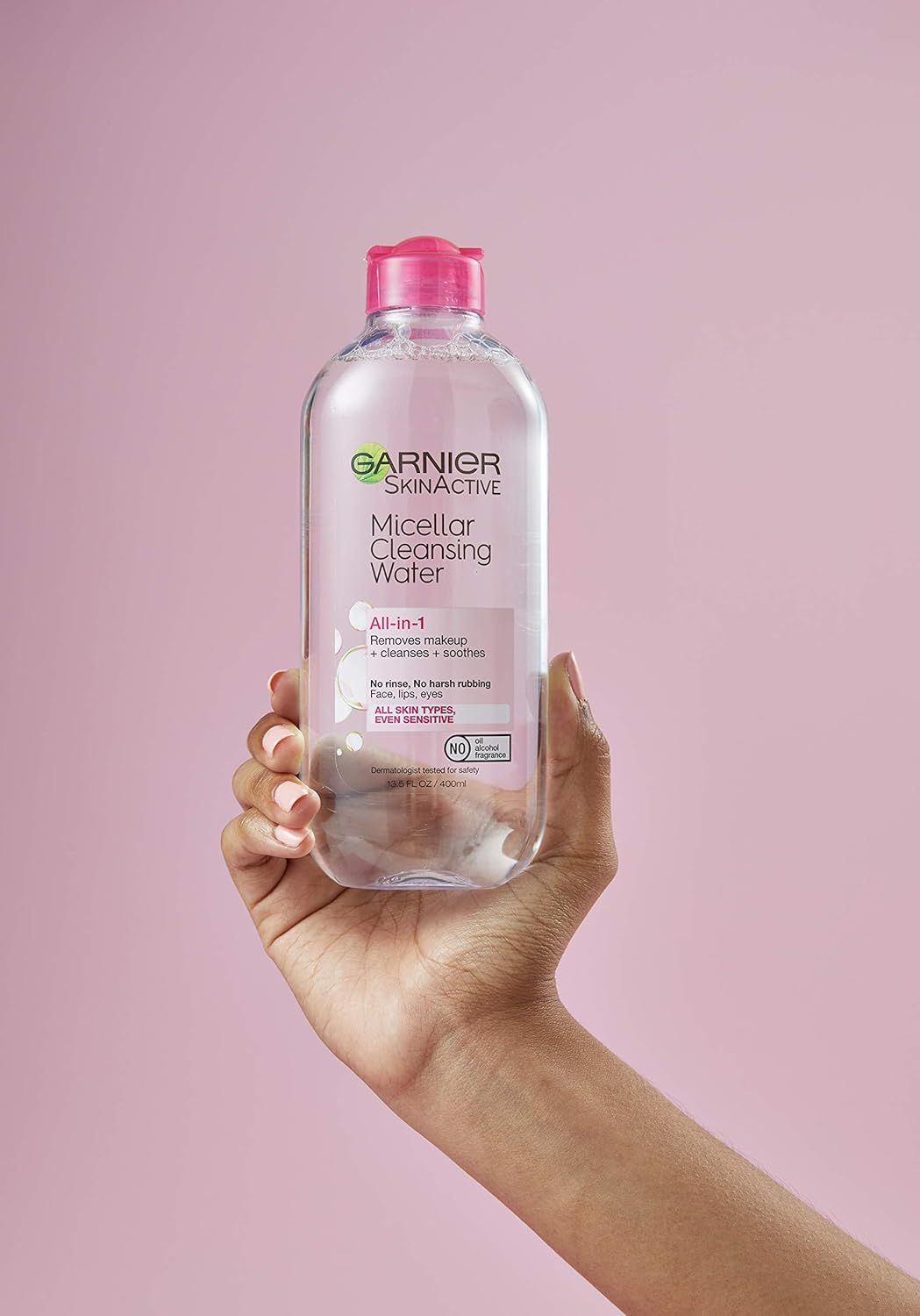Shows the product in a real-world context being held by a hand against a lifestyle background, allowing shoppers to visualize the product size and appearance without any feature callouts or text…