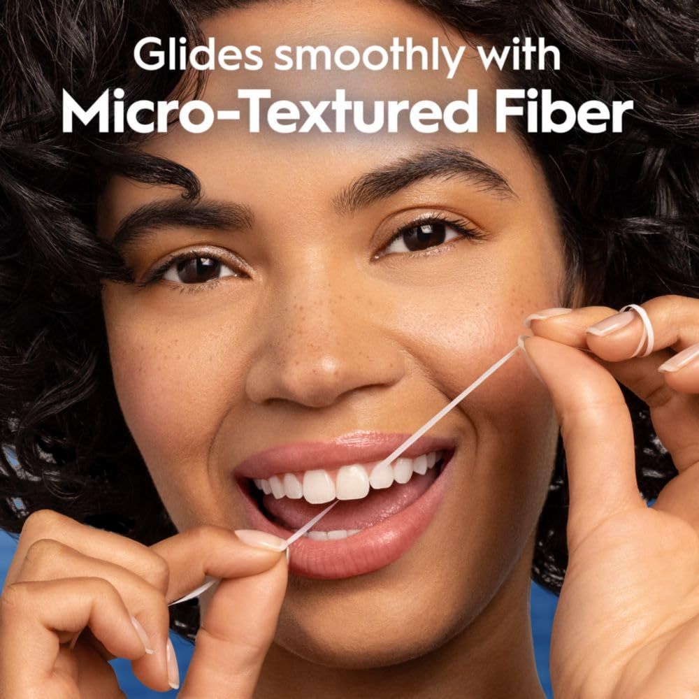 Highlights the product's micro-textured fiber technology that allows smooth gliding between teeth, reassuring shoppers of a comfortable and effective flossing experience.