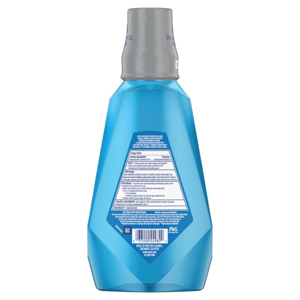 Shows the back label of the mouthwash bottle with drug facts, warnings, and usage instructions for shopper reference.