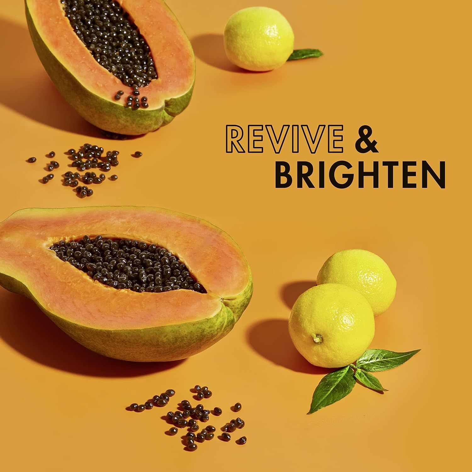 Communicates that the product contains natural ingredients (papaya and lemon) that revive and brighten skin, appealing to shoppers seeking skincare benefits.