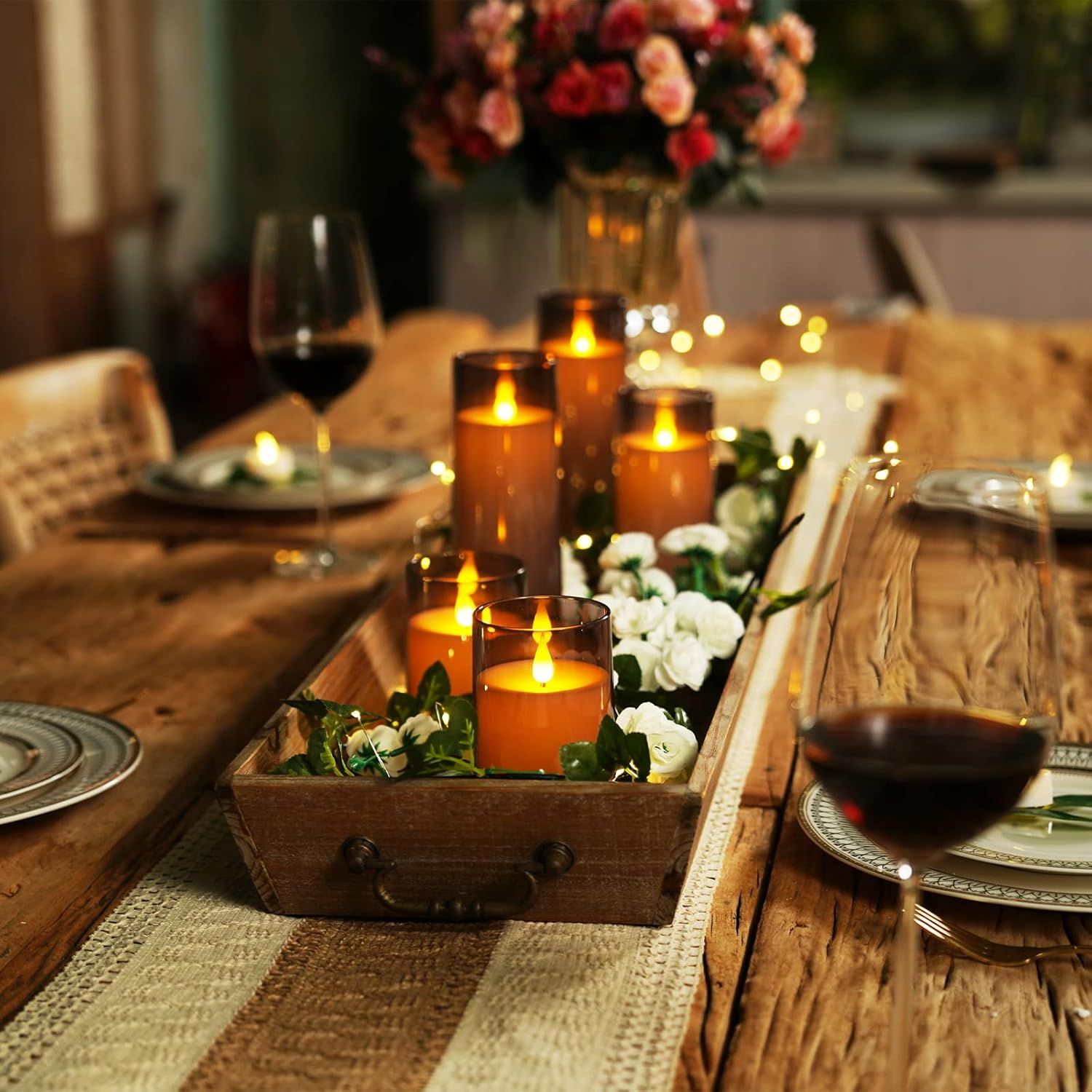 Showcases the product (candles) in a real-world dining context to help shoppers visualize how it creates ambiance and enhances their home entertaining experience.