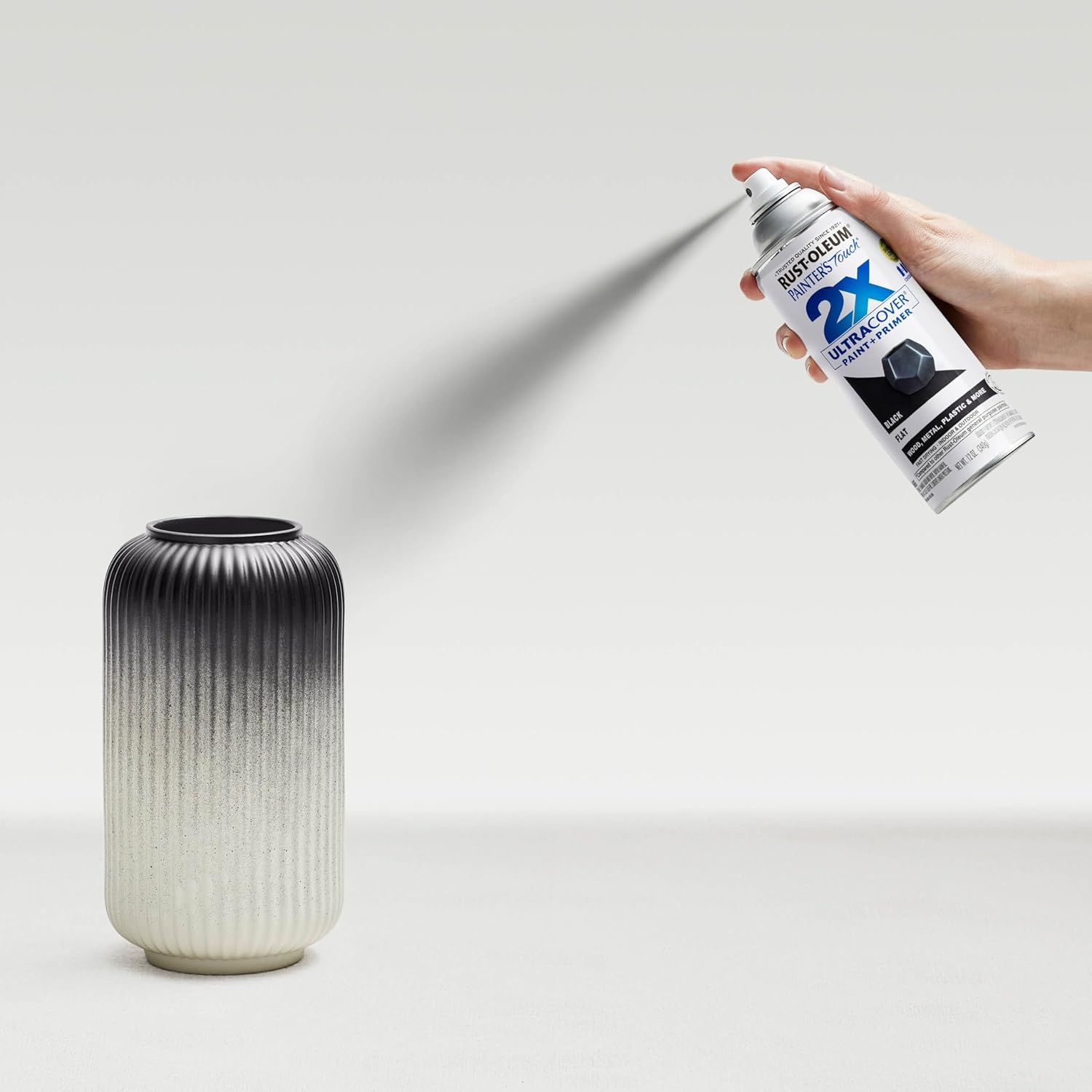 Demonstrates how to apply the spray paint product to achieve a gradient effect, showing the ease of use and application technique. Highlights the product's ability to create a smooth gradient…