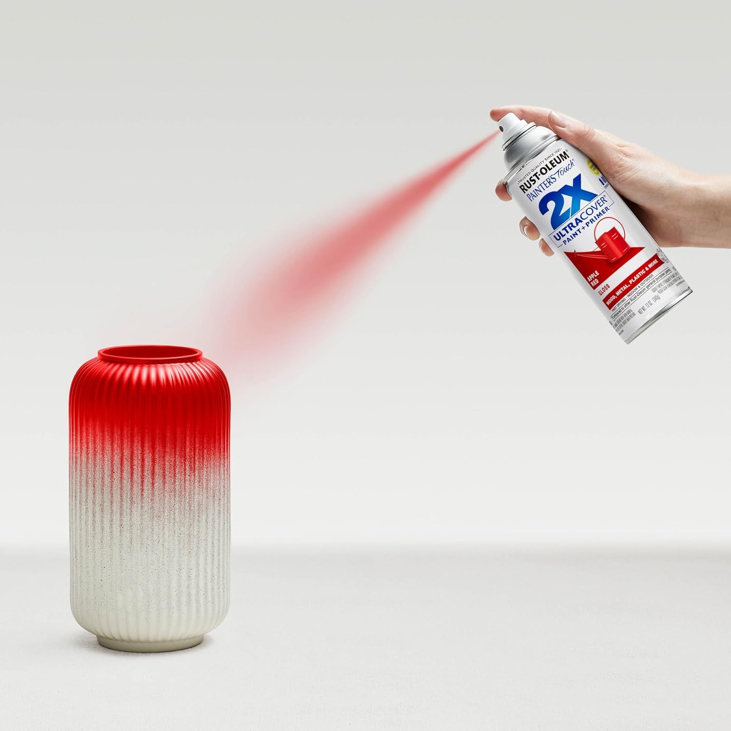Demonstrates how to apply the spray paint product to achieve an even, professional finish on objects like the vase shown. Shows the ease of use and quality results achievable with the Rust-Oleum 2X…