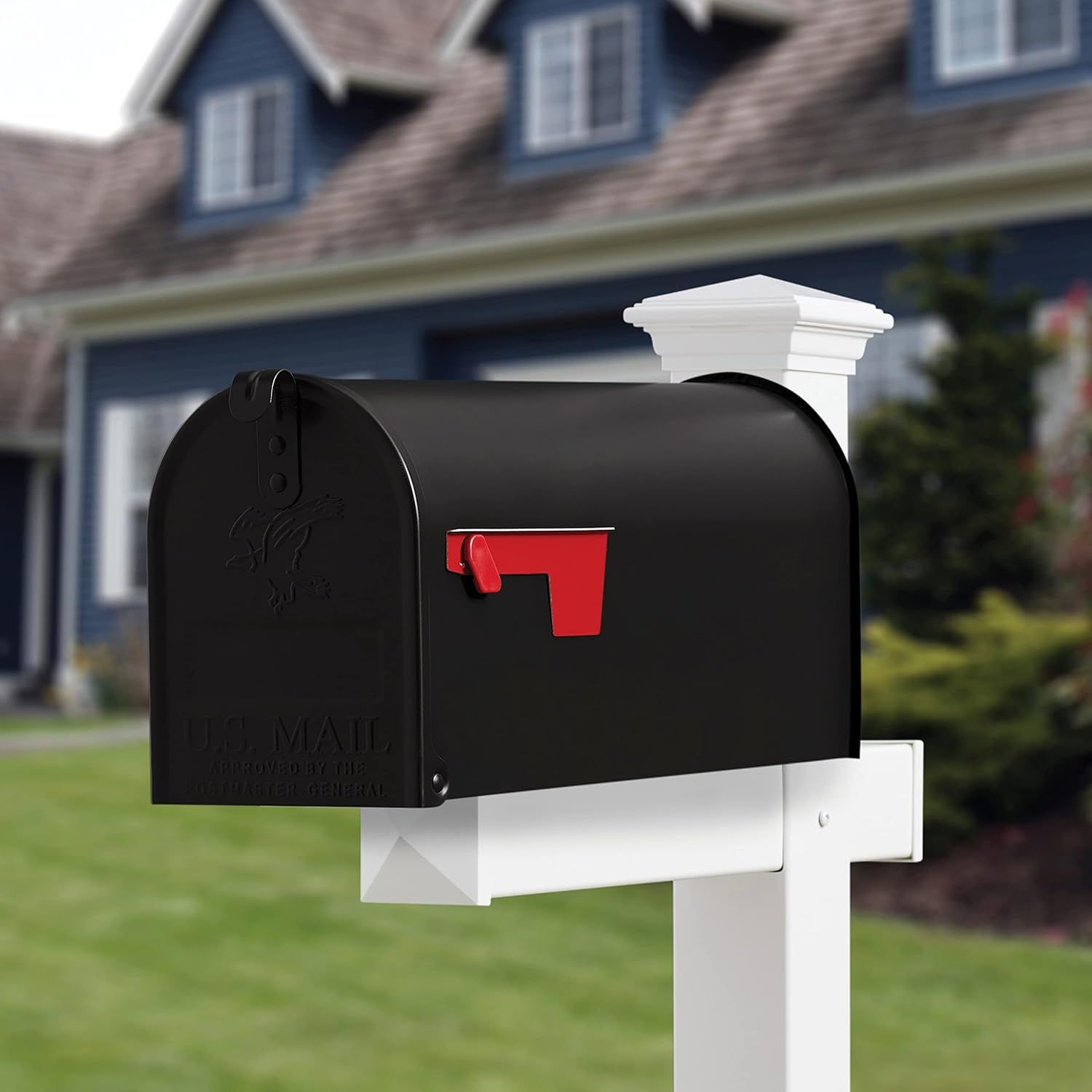 Demonstrates the product in a real-world residential environment to help shoppers visualize how the mailbox would look installed at their home.