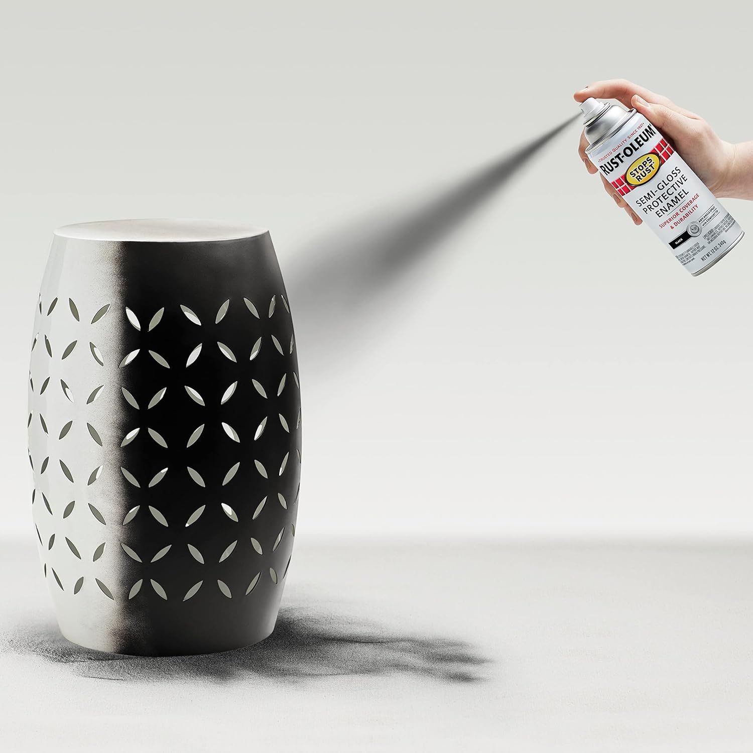 Demonstrates how to apply the Rust-Oleum spray paint product to an object, showing the simple spray-on application method to reassure shoppers about ease of use. Highlights the straightforward spray…