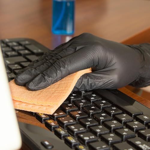 Demonstrates how to properly clean the product (keyboard) using a sponge, showing the user the correct method for maintenance.
