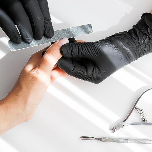 Demonstrates proper usage technique for the nail file product, showing shoppers how to hold and use the tool correctly during a manicure.