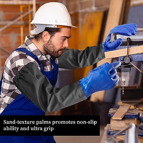 Demonstrates the gloves' sand-textured palm feature in a real-world work scenario to reassure shoppers of secure grip and handling capability during manual tasks.