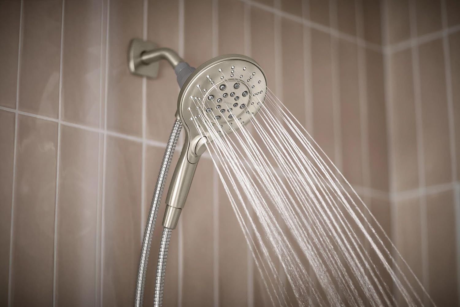 Demonstrates the product in a real bathroom setting with water flowing to show the showerhead in action and help shoppers visualize it in their own home.