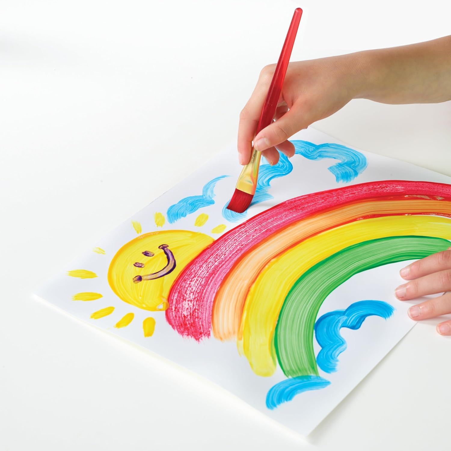 Shows the product in use in a real-world creative context, demonstrating how children can use the paint or art supplies to create colorful artwork.