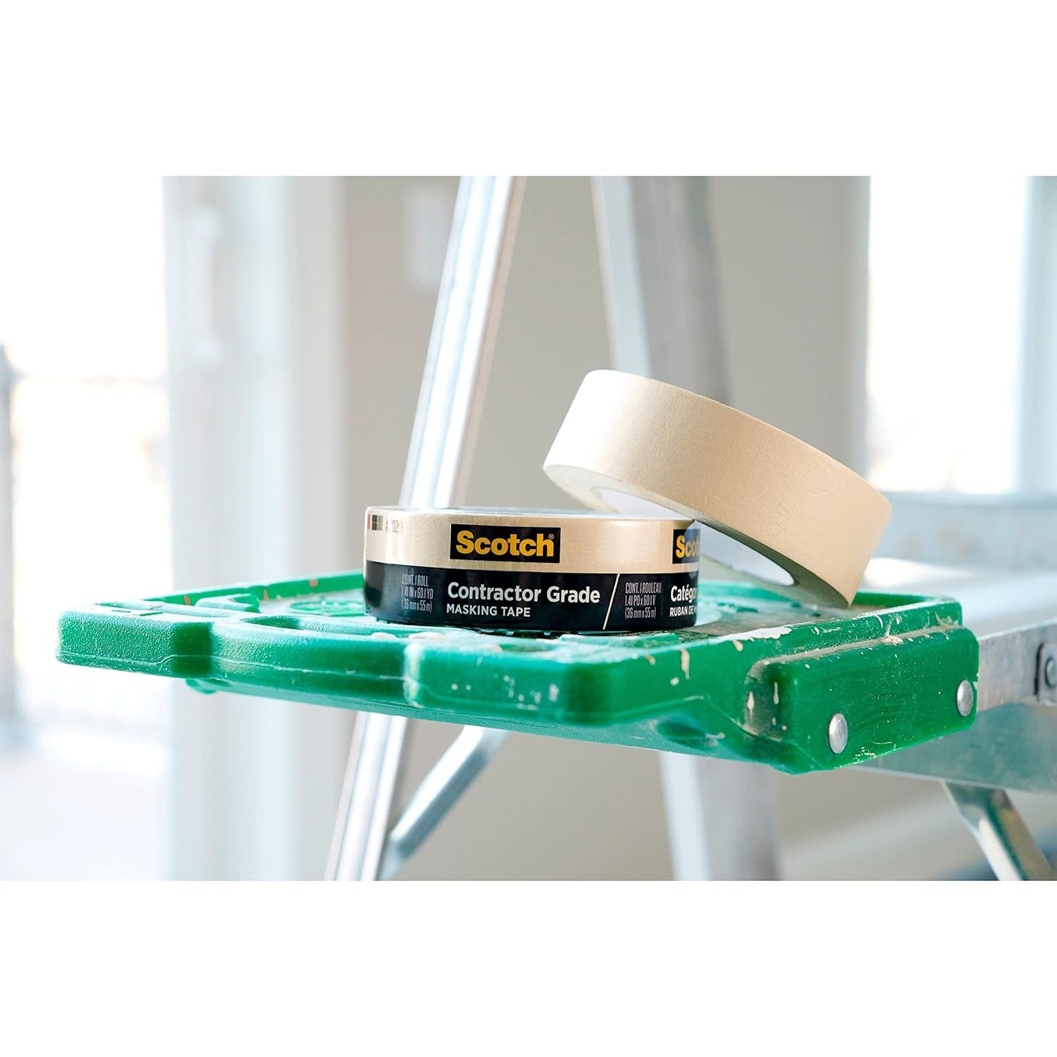Shows the product in an authentic contractor/painting environment to help shoppers visualize the product in actual use during home improvement projects.