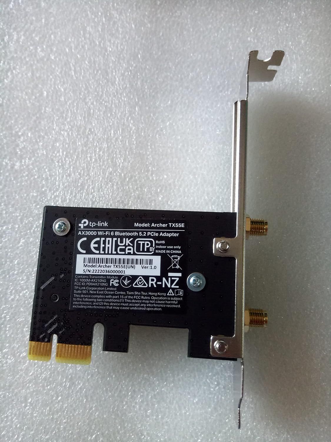 Provides a clean, catalog-style view of the TP-Link Wi-Fi 6 Bluetooth PCIe adapter showing the product's physical form, connectors, and label details without any distractions.
