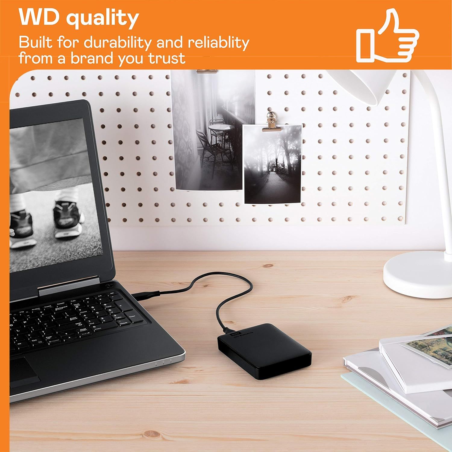 Communicates the WD brand's core values of durability and reliability, building trust and brand recognition with shoppers by emphasizing quality heritage. Shows the external hard drive in a…
