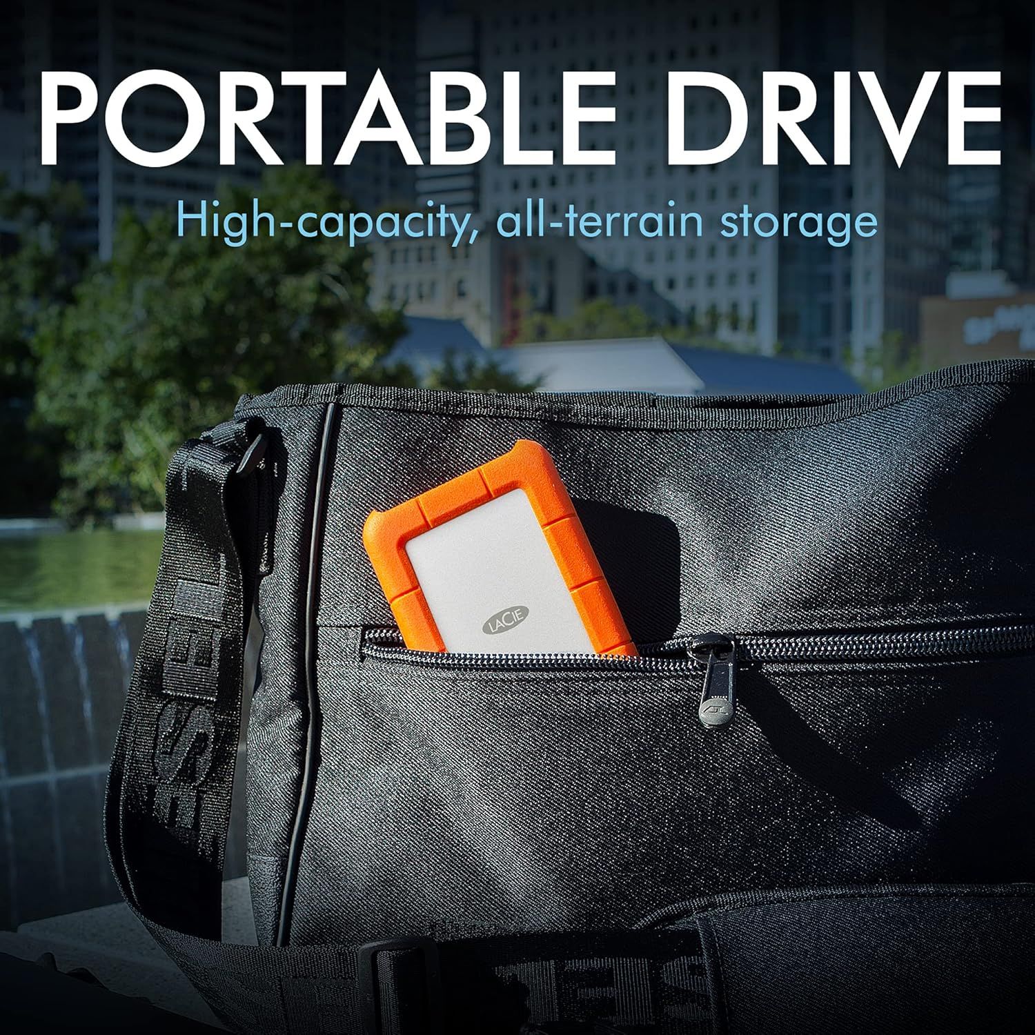 Communicates that the portable drive is compact, travel-friendly, and durable enough to be carried anywhere, even in outdoor or rugged environments.