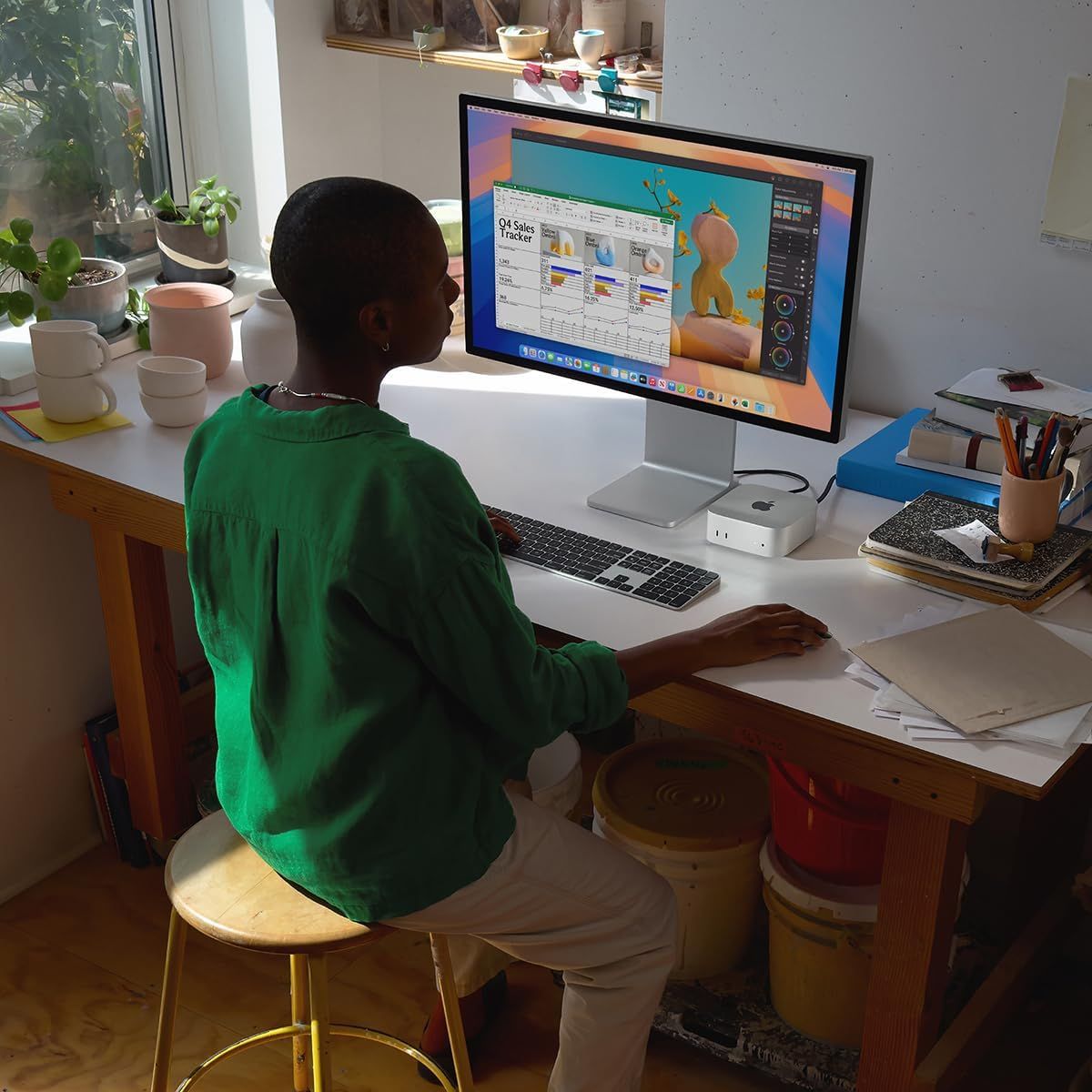 Demonstrates the product in a real-world home office environment to help shoppers visualize how it fits into their daily creative workflow and lifestyle.