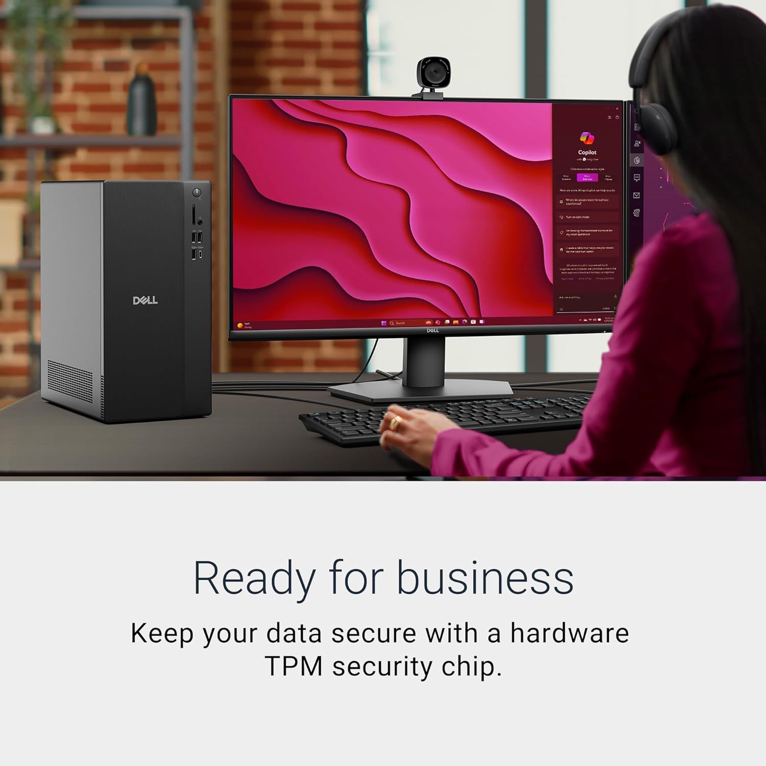 Communicates that the Dell computer is designed for business use with built-in hardware security (TPM chip) to protect data, reassuring business customers about security and reliability.