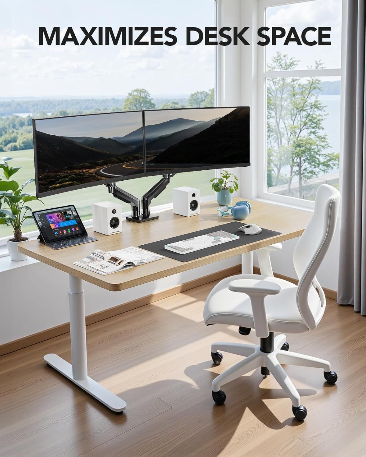 Demonstrates how the dual monitor arm setup maximizes desk space by elevating monitors off the desk surface, creating a clean and organized workspace.