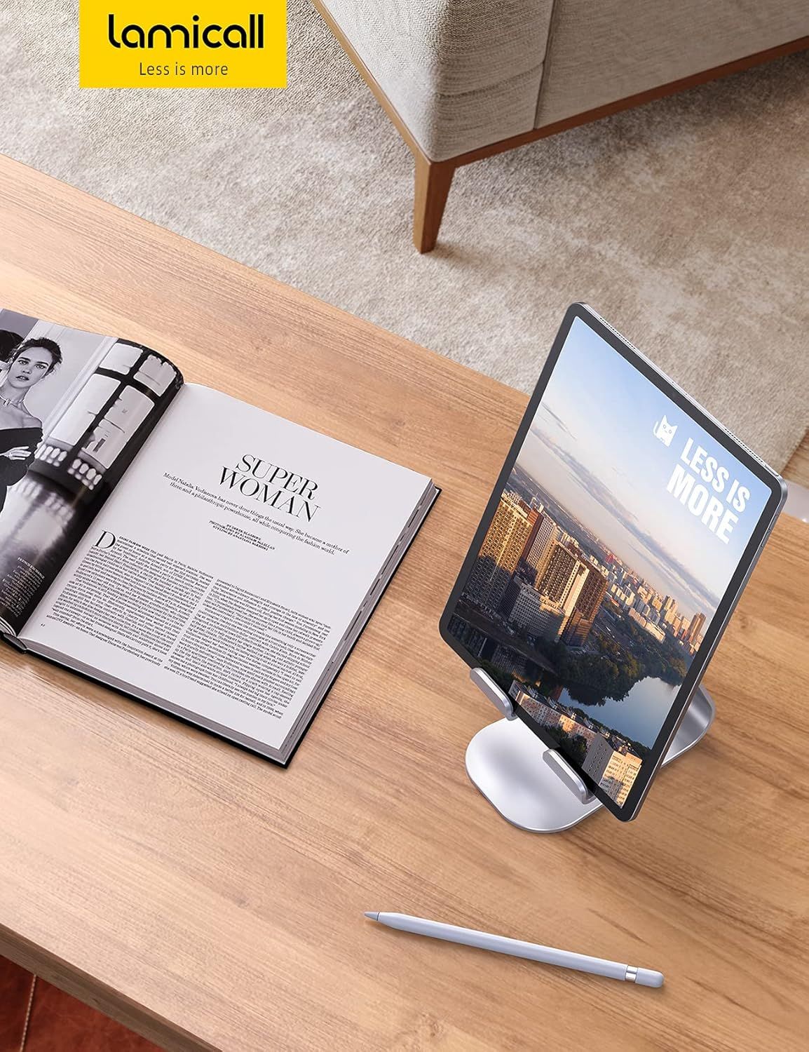 Showcases the product (tablet stand) in a real-world home or office setting to help shoppers visualize how it fits naturally into their lifestyle and workspace.