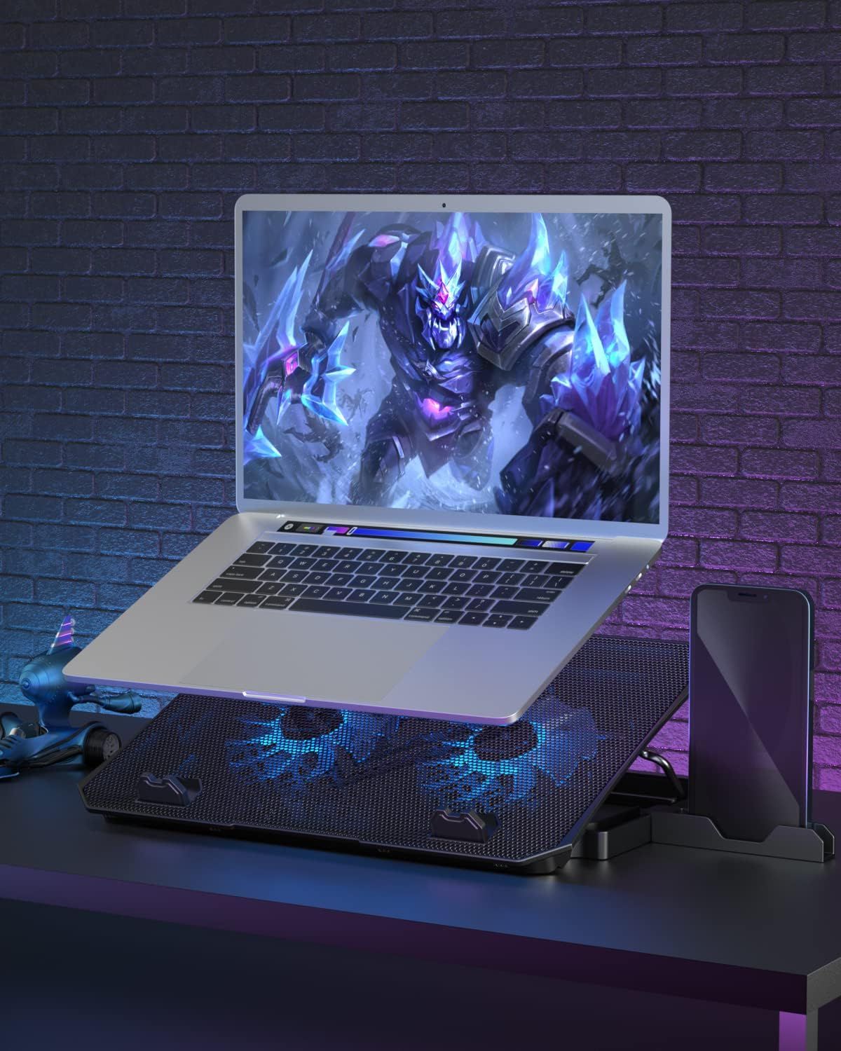 Showcases the product in a real-world gaming environment to help shoppers visualize how the laptop cooling pad fits into their setup and lifestyle.