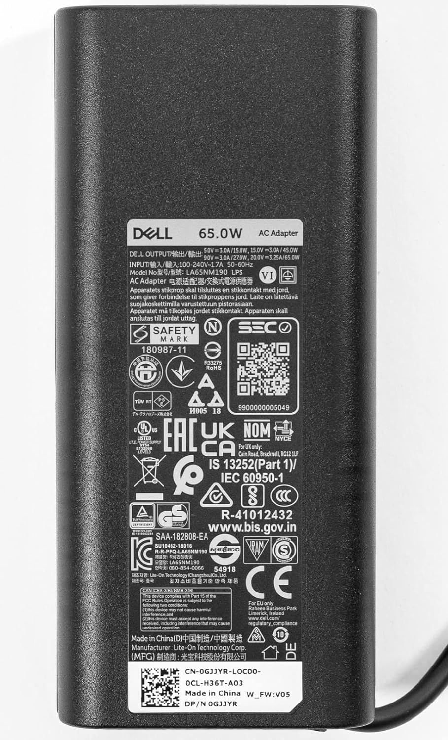 Provides a clean, catalog-style view of the Dell AC adapter showing the product label and certifications for shopper reference.