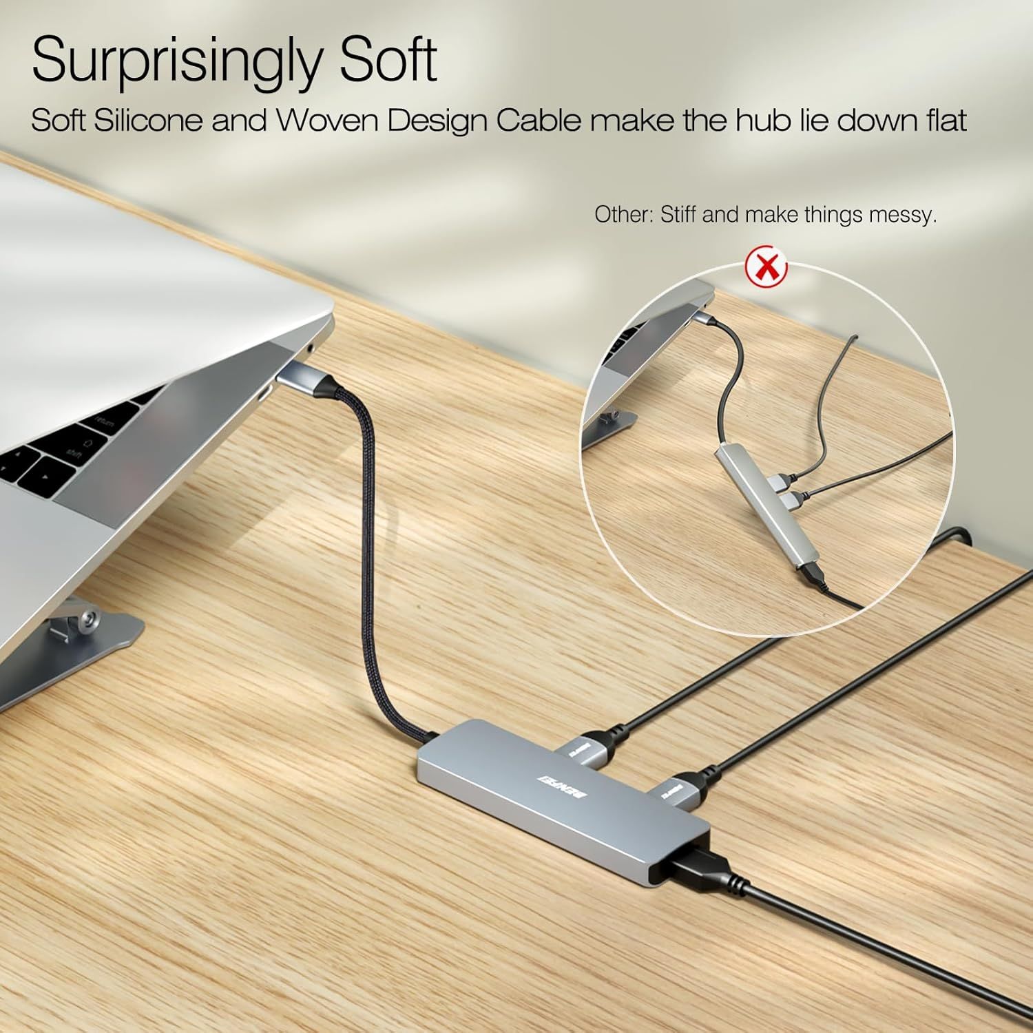 Demonstrates that this product's soft, flexible cable design allows the hub to lie flat on the desk, unlike stiff competitor cables that create messy tangles and clutter. Highlights the key benefit…